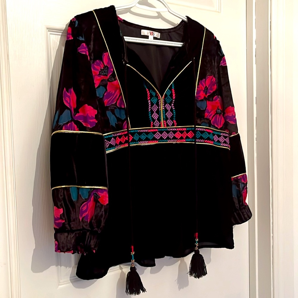 Beautiful embroidered peplum